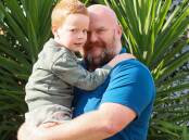 Charlie and dad Dan Berryman, who says he is unable to get an appointment with a paediatrician in the public health system. Picture: Les Smith