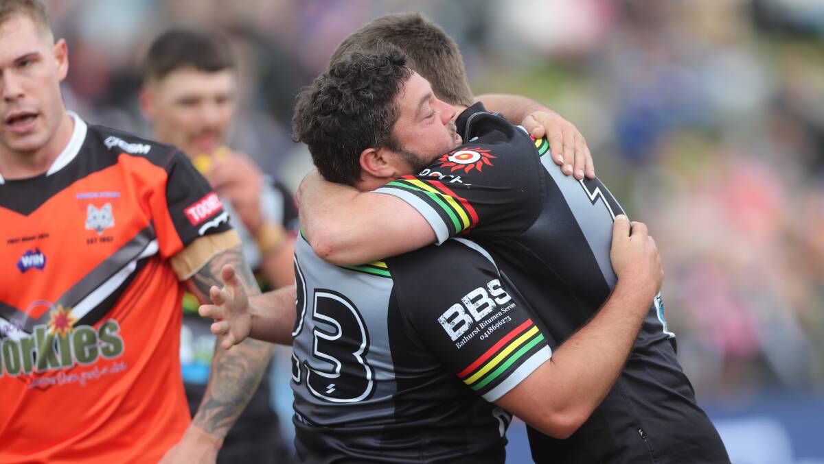 Josh Merritt is embraced after scoring during his Bathurst Panthers regular season debut for the club. Picture by Phil Blatch.