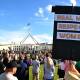 Crowds in Canberra marched on Parliament House to call for action to end violence against women. (Lukas Coch/AAP PHOTOS)