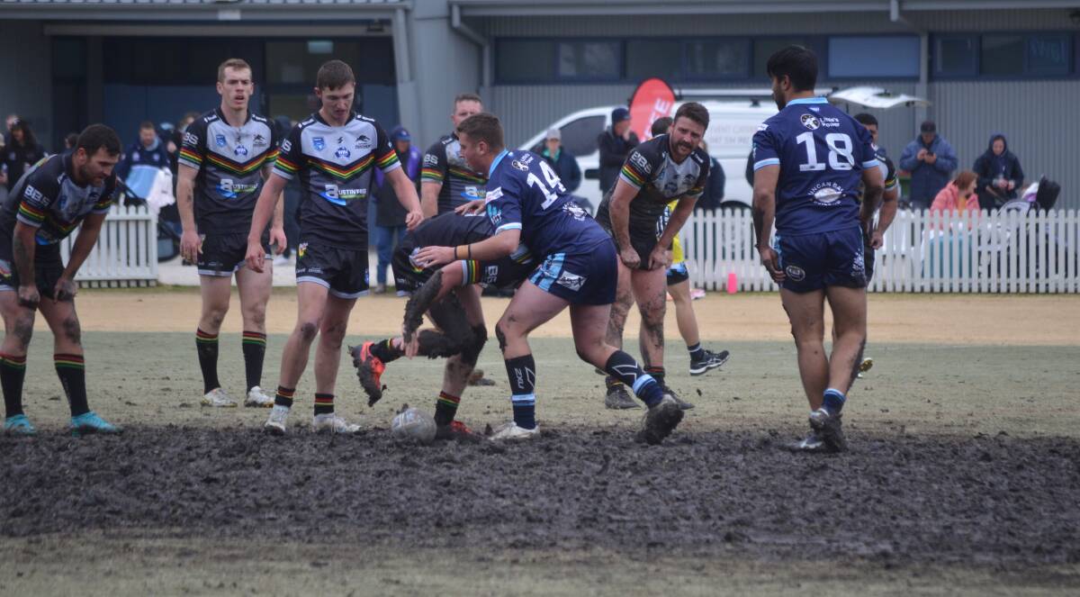 Bathurst Panthers and Orange Hawks played out a brutal match on a muddy Wade Park. Picture by Dominic Unwin