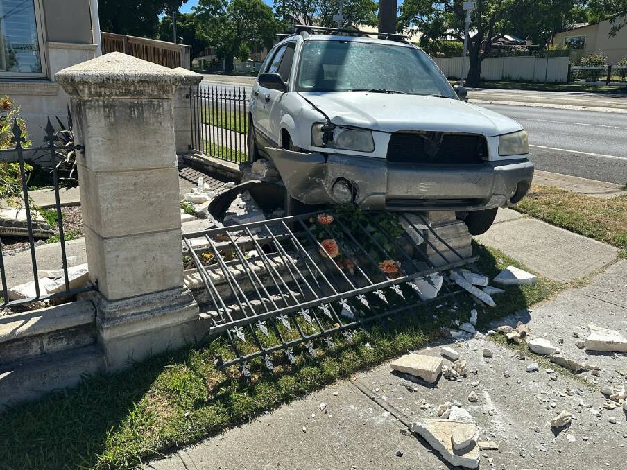 Car left in drive with handbrake off rolls across Stewart Street highway into a fence. Picture supplied