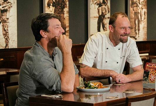 ClubsNSW ambassador and former Parramatta Eels player Nathan Hindmarsh with Bathurst RSL sous-chef Andrew Murdoch on June 14. Picture by James Arrow