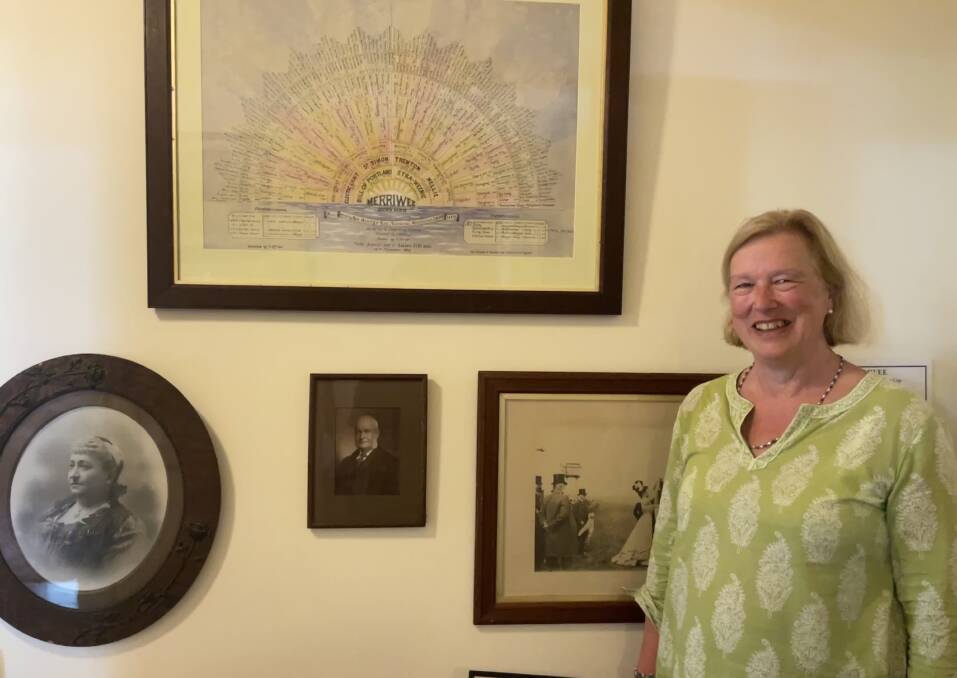 Helen Lloys standing in Miss Traill's House with a picture depicting the family tree, and pictures of her distant relatives George Lee and Emily Kite. Picture by Alise McIntosh