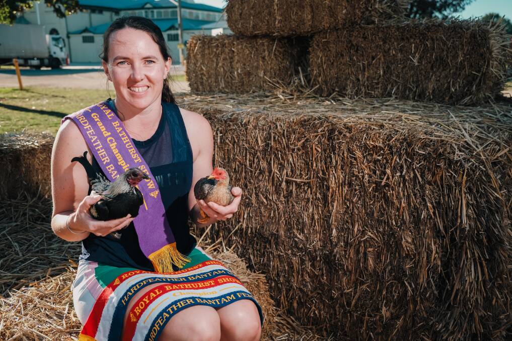 Miss Cosgrove and her chickens, who were prize winners at the Royal Bathurst Show. Picture by James Arrow