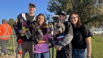 Simon, Katelyn, Andrew and Sue Dunn, travelled from the Northern Beaches with their dogs Bambi and Eddie [named after Panthers player Dylan Edwards] to attend the event. Picture by Alise McIntosh