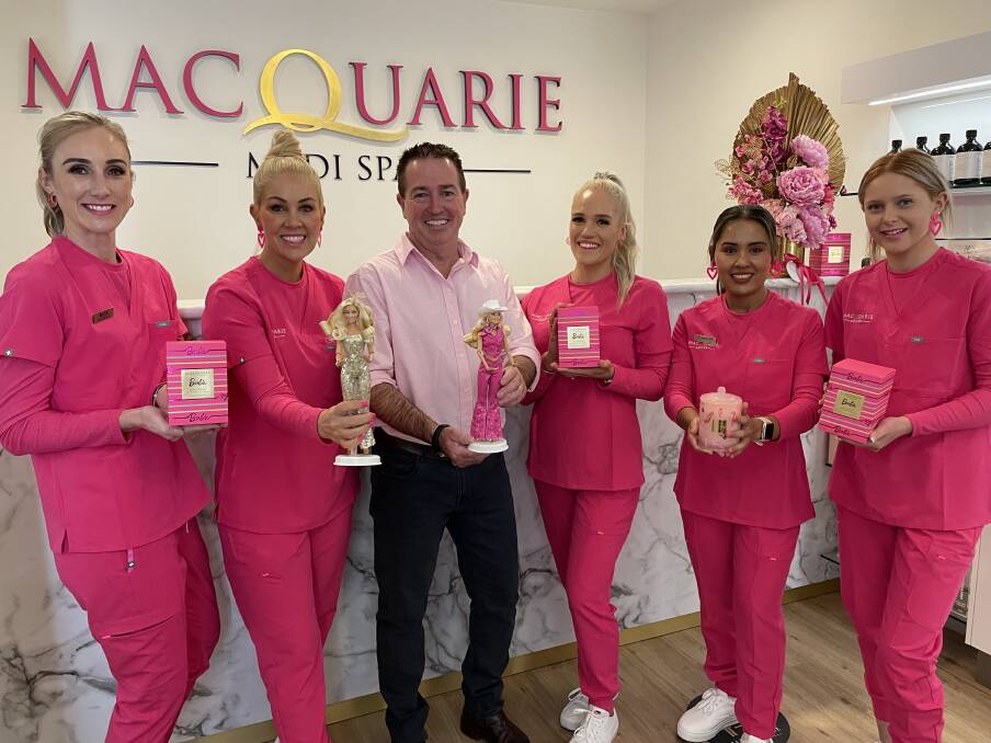 The team at Macquarie Medi Spa; Beck Hackett, Spa owner Karla McDiarmid, Member for Bathurst Paul Toole, Pru Ashe, Chanly Strachan and Poppy Sargent are embracing pink for the month of July. Picture by Alise McIntosh