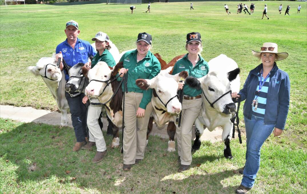 Kelso High agriculture teacher Jarrod Kelly with students Sam Franklin, Chloe Turner, and Alixis Chalmers and training agriculture teacher Katrina Abbott with the Denison College Kelso High Steers bound for the Royal Easter Show. Picture by Chris Seabrook 