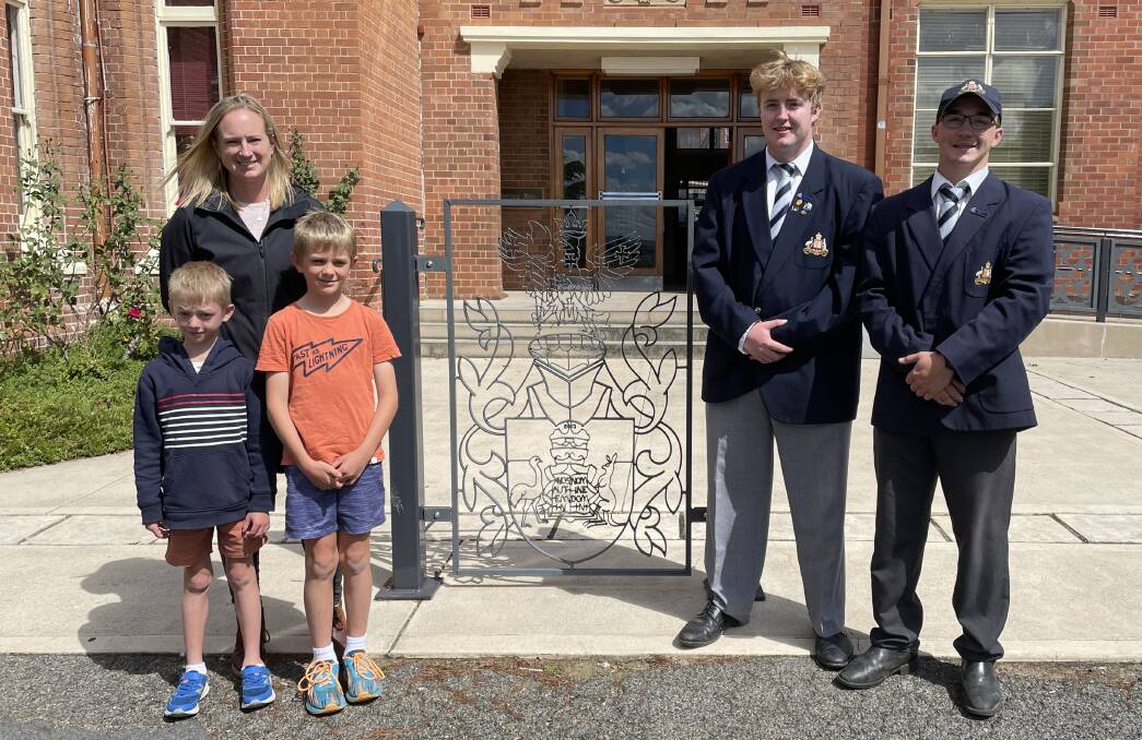 O'Connell resident Shana Reed brought her boys Jasper and Hamish Spreckley to the Stannies open day, where they were guided by students Will Grant and Jack Nunan. Picture by Alise McIntosh
