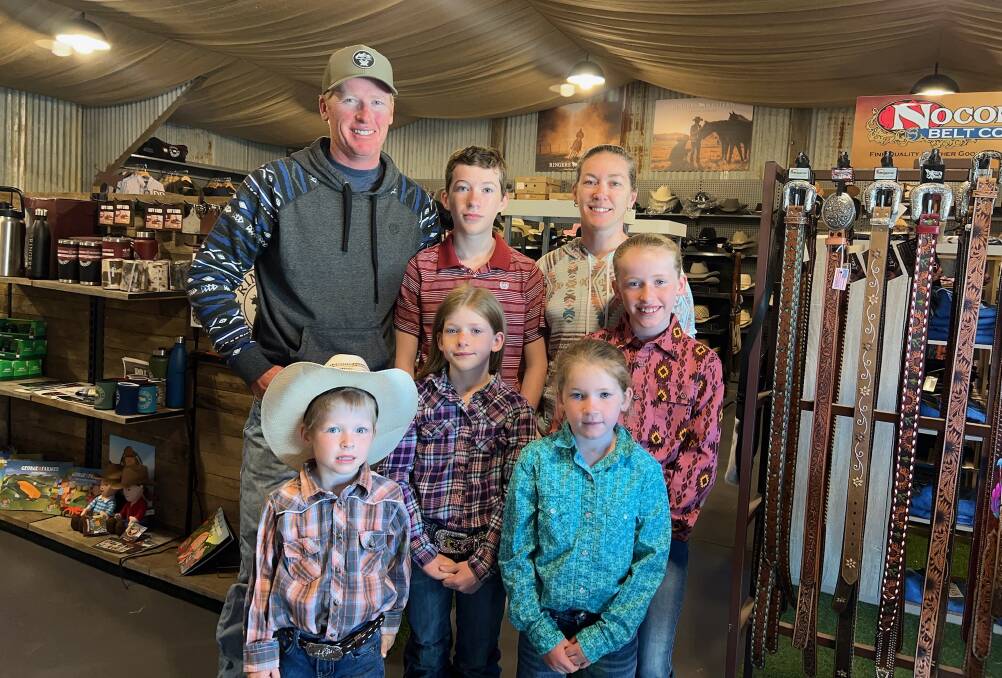 The Clayton family in the new shopfront of Clayton's Western and Outdoors. Picture supplied