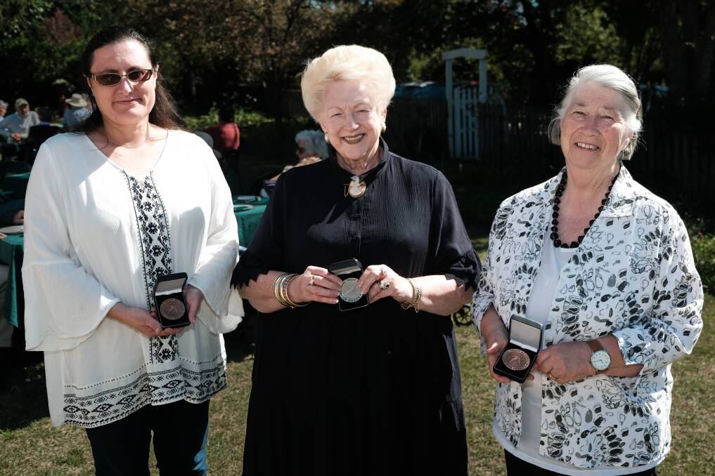 April Unsworth, Susan Morris and Pat Cutts all received awards from the National Trust for their volunteering efforts at Miss Traill's House and Garden. Picture by James Arrow.