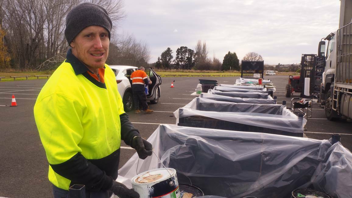 Zach Stammers from Environmental Treatment Solutions helping Bathurst residents dispose of household chemicals during the 2022 Chemical Cleanout. Picture by Sam Bolt