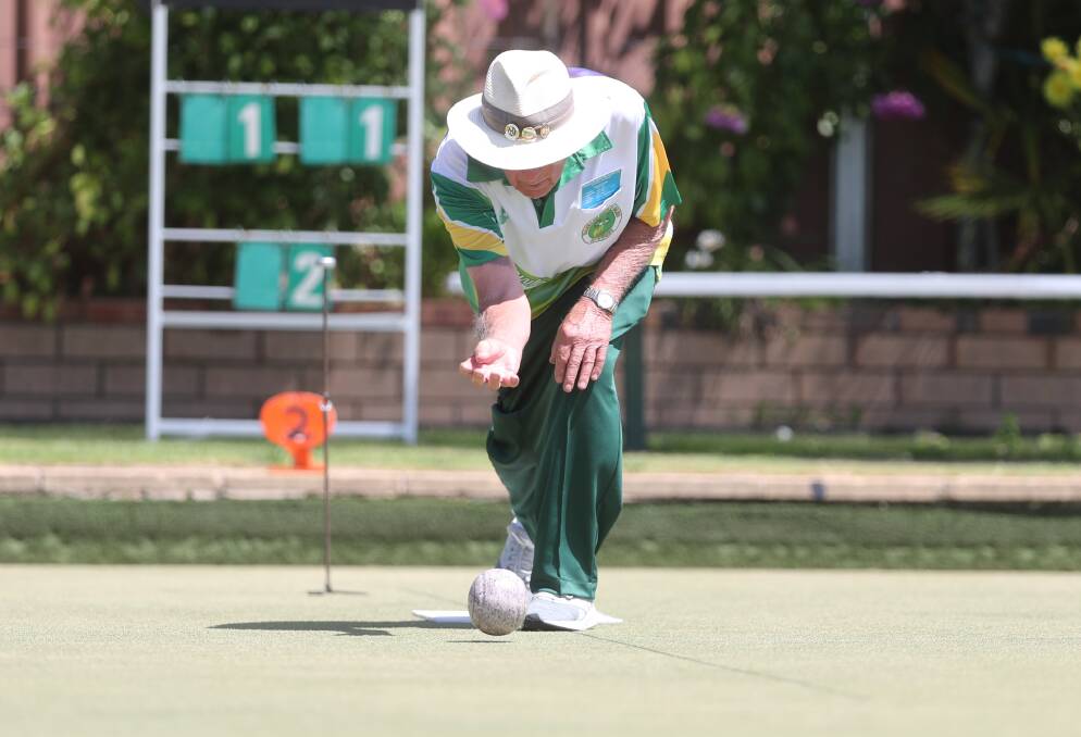 Max Elms lines up a shot on the green at the Majellan Bowls Club. Picture by Phil Blatch