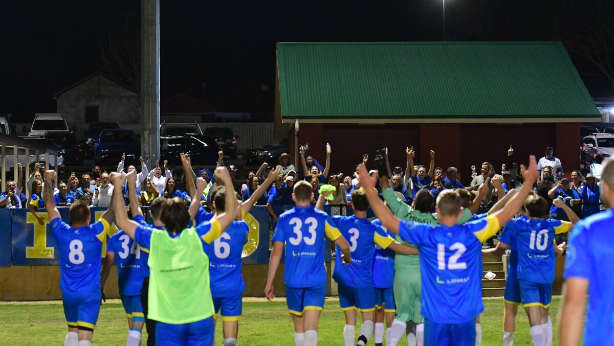 Eglinton DFC celebrates with its supporters after Sunday's grand final win. Picture by Bradley Jurd