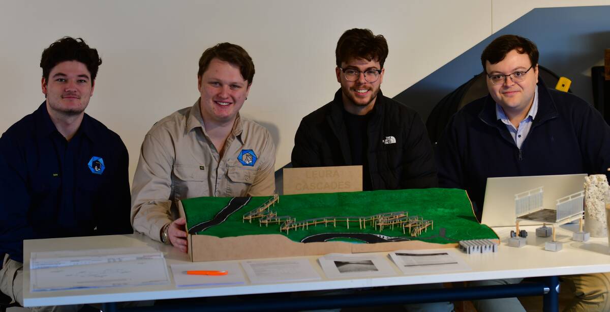 Charles Sturt University engineering students Thomas Hunter, Blake Martin, Luke Dunkley and Will McNaughton, with their Leura cascades boardwalk project. Picture by Bradley Jurd