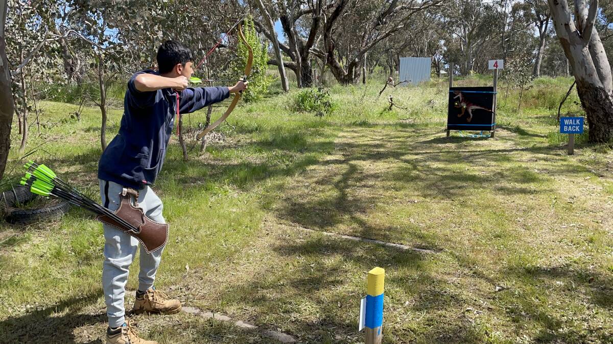 Umar Seedat from the Maydaan Archery Club in Bringelly, Sydney, fires a shot at a target at the Bathurst Archers range on Sunday. Picture by Bradley Jurd. 
