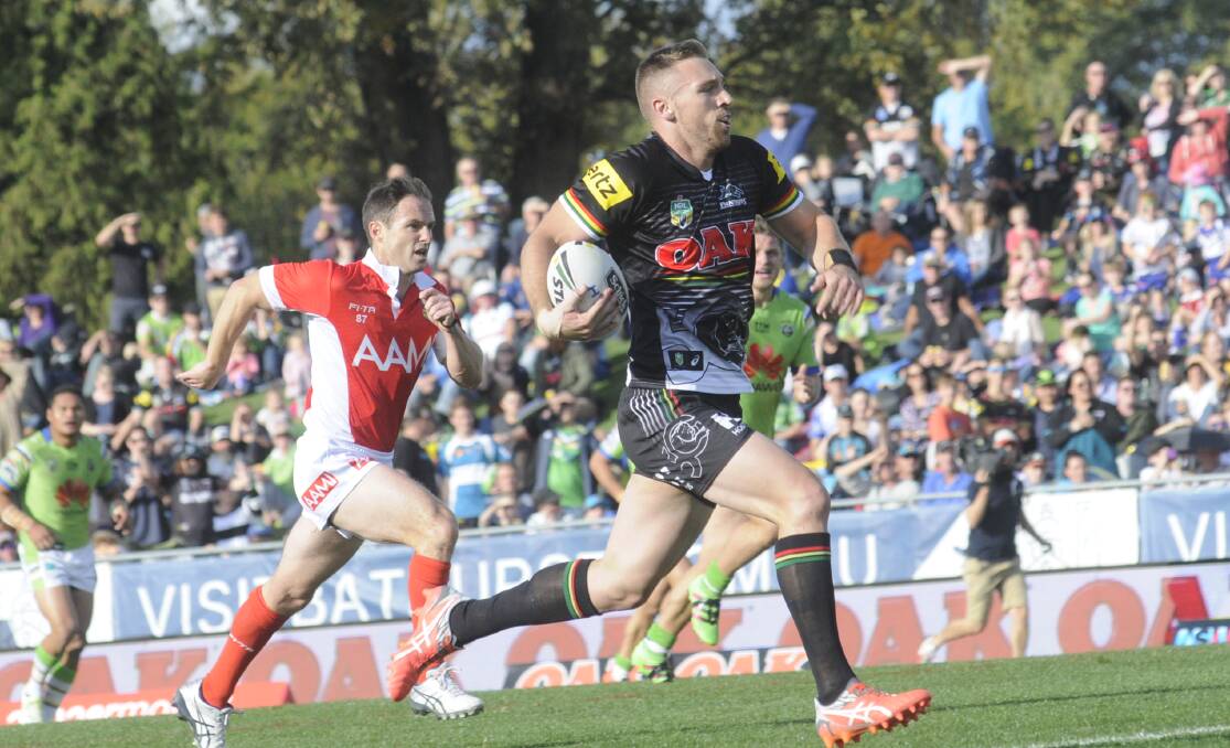 Bryce Cartwright runs away for the first of the Penrith Panthers' three tries in their thrilling 19-18 win over the Canberra Raiders at Carrington Park in 2016. Picture by Chris Seabrook