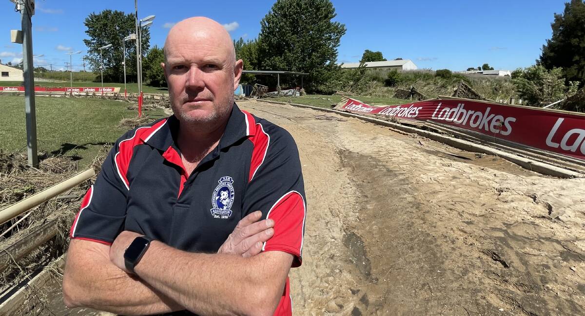 Bathurst Greyhound Racing Club track manager Jason Lyne at the destroyed Kennerson Park following November's flooding. Picture by Bradley Jurd