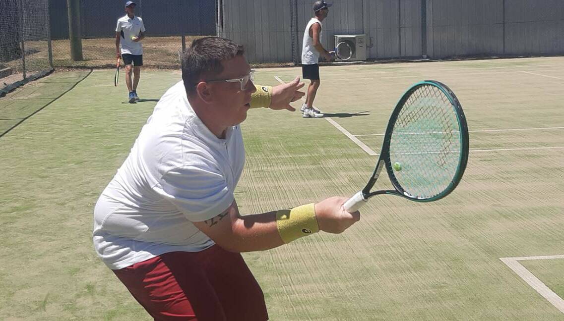 Matt Tree sets himself to hit the ball in a game of tennis. Picture supplied