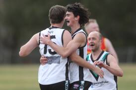 Bathurst Bushrangers celebrated one of their 30 goals against Dubbo Demons on Saturday. Picture by Phil Blatch