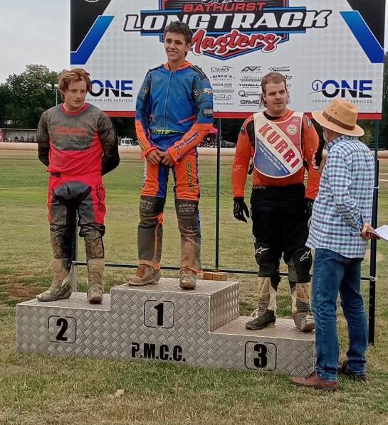 Jett Carter on the podium after winning the Pro 250cc. Picture by Darren Hoarey