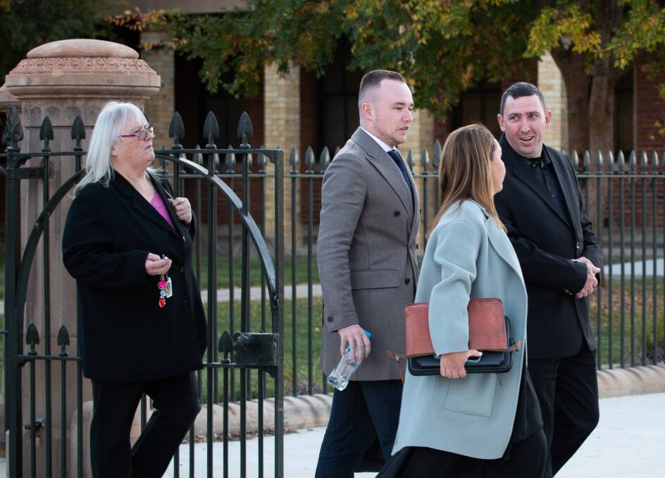 Stephen Shane Greenfield (black suit, far right) leaving Bathurst Courthouse on May 23, 2024. Picture by James Arrow.