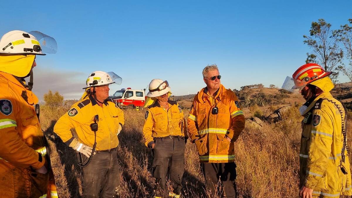 Wattle Flat Sofala volunteer bush fire brigade members on March 9 defending the southern flank of the Hill End area fire. Picture by Wattle Flat Sofala volunteer bush fire brigade 
