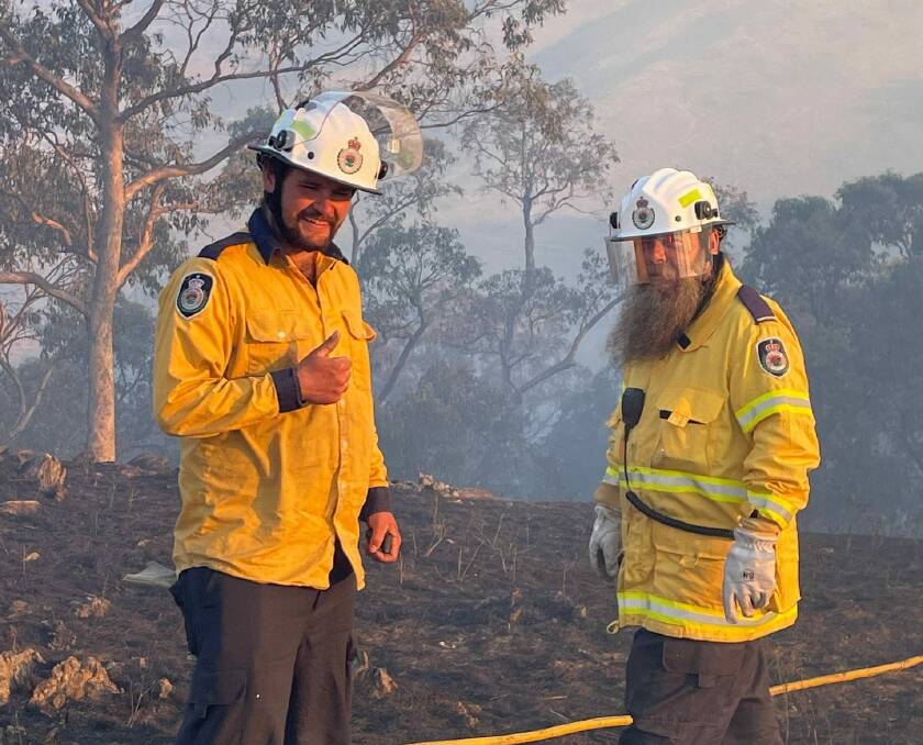 Volunteer firefighters on the fireground near Hill End on March 12, 19 days before the blaze was declared out. Picture by the Hill End Rural Fire Brigade