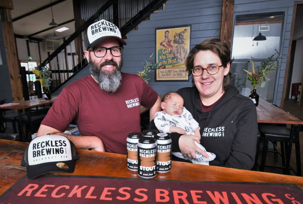 Reckless Brewing owners Jarrod Moore and wife Grace Fowler with daughter Hendrix last year. Picture by Chris Seabrook. 