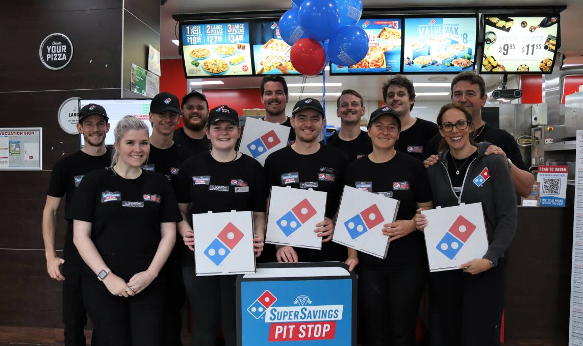 James and Astrid Acreman (far right) with some of the Domino's Kelso staff in the lead-up to last year's attempt to break the record for the number of pizzas made in a week. Picture by Amy Rees