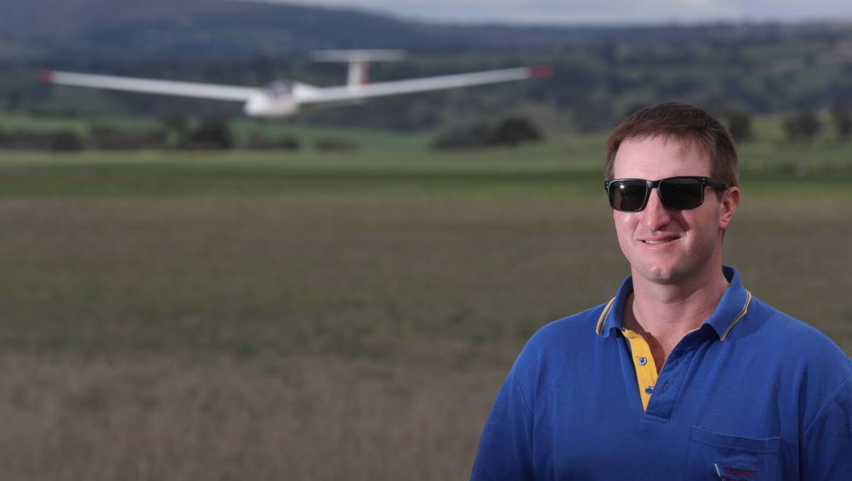 UP IN THE AIR: Bathurst Soaring Club president Charles Durham at Piper's Airfield. Photo: PHIL BLATCH