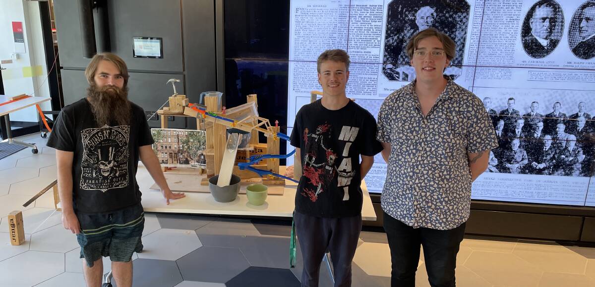 Isaac Prior, Lewis Glen and Grifin Brooks during the Rube Goldberg challenge at CSU Bathurst in March.