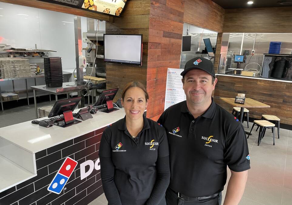 Astrid and James Acreman in the newly renovated and reopened Domino's Kelso store.