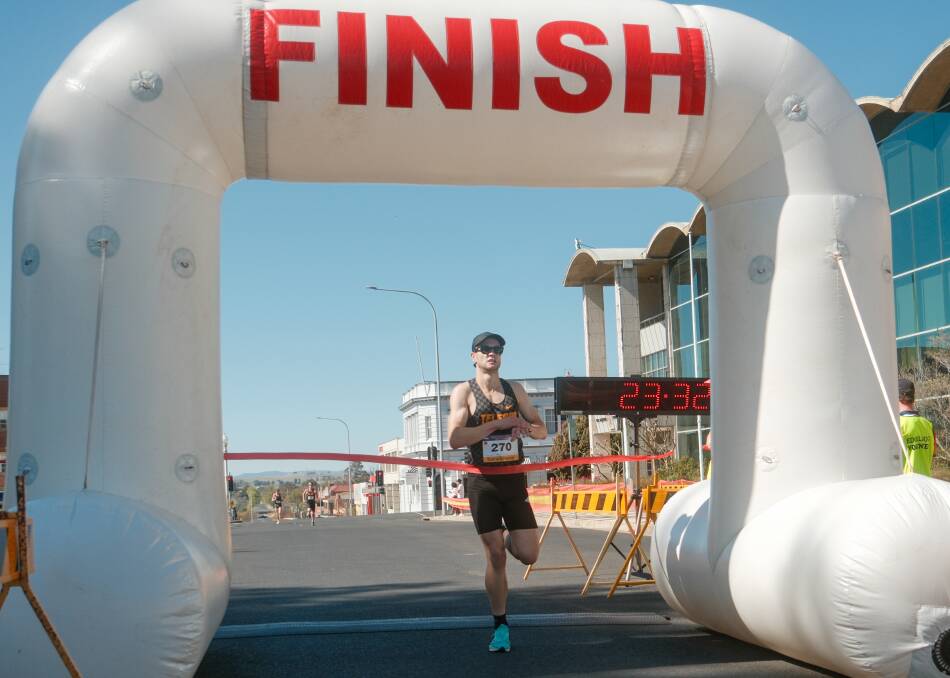 Harry McGill crosses the line to win the 2023 Bathurst Edgell Jog. Picture by James Arrow.