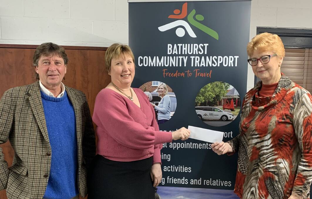 Bathurst Community Transport CEO Kathryn Akre (second from left) receives a $4000 donation from Christopher Morgan and Marion Pearce of Bathurst Highland Society. Picture by Domino Houlbrook-Cove.