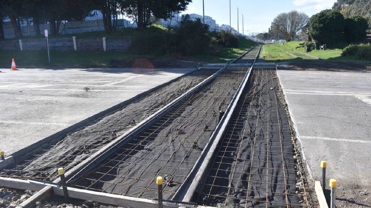 A new crossing on Oberon's Albion Street in September last year being built as part of the railway line restoration project. Picture by Peter Bowditch.
