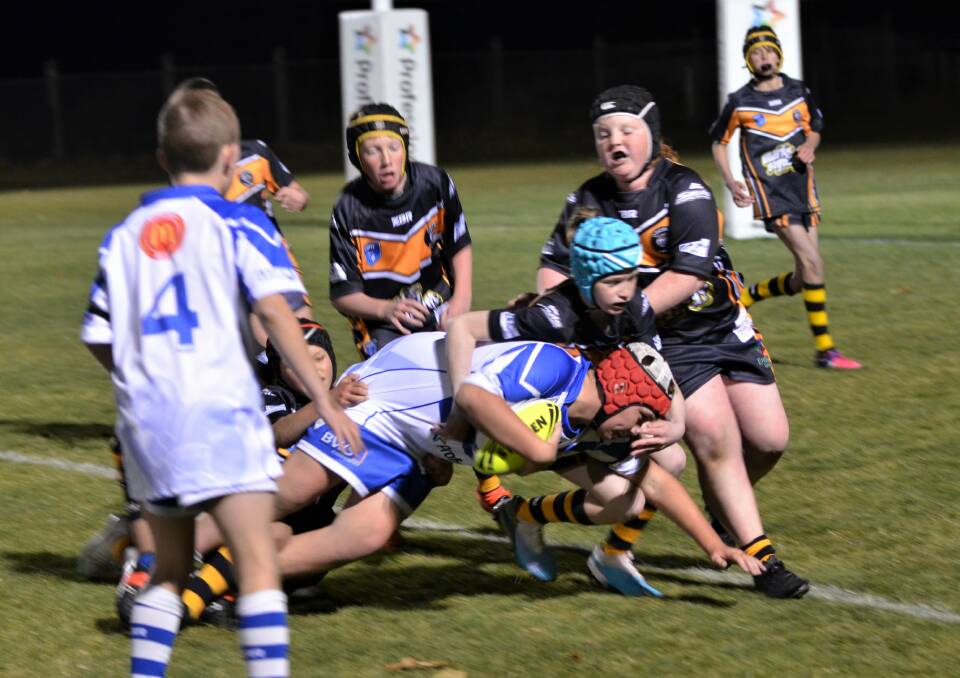 St Pat's White prop Darcy Williams dives towards the line in Friday's match under 11s against Oberon Panthers. Picture by Anya Whitelaw