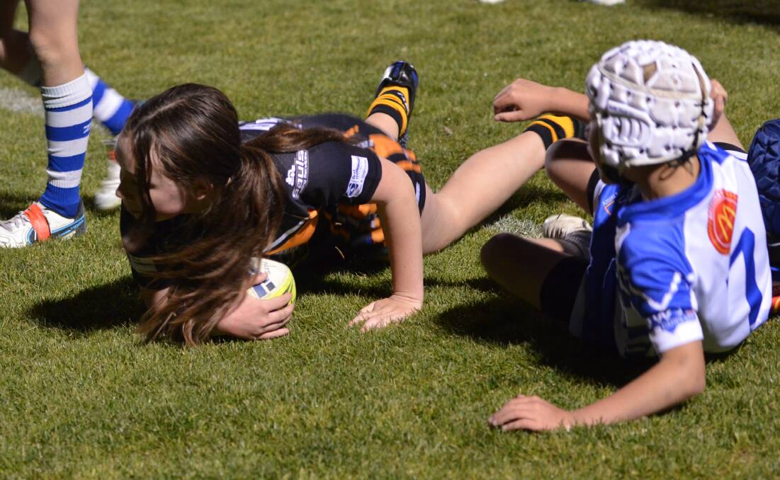 Amber Thackeray scores the first try for the Big Cats. Picture by Anya Whitelaw