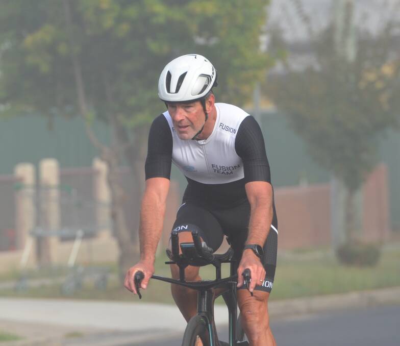 Richard Hobson, pictured competing at Bathurst, completed his fifth Port Macquarie Ironman race on the same day his daughter Lucy did her first. Picture by Anya Whitelaw