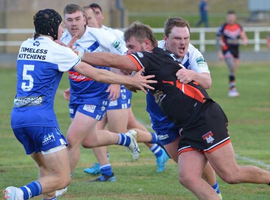 Saints duo Will Poole and Noah Griffiths work to half Lithgow prop Ryan Jervis. Picture by Anya Whitelaw