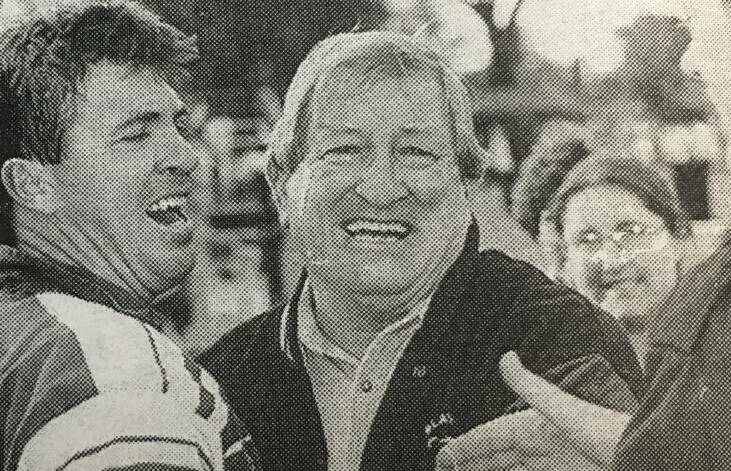 Blayney coach John Davis embraces outgoing Bears veteran Steve Mooney after the 1996 decider.
