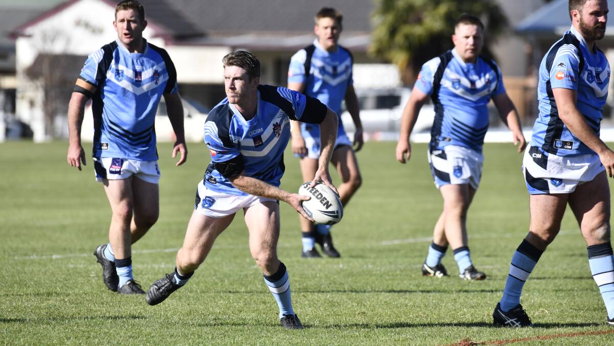 Toby Apps dishes the ball out wide during Group 10's clash against Group 11 at Blayney on Saturday. Picture by Jude Keogh.
