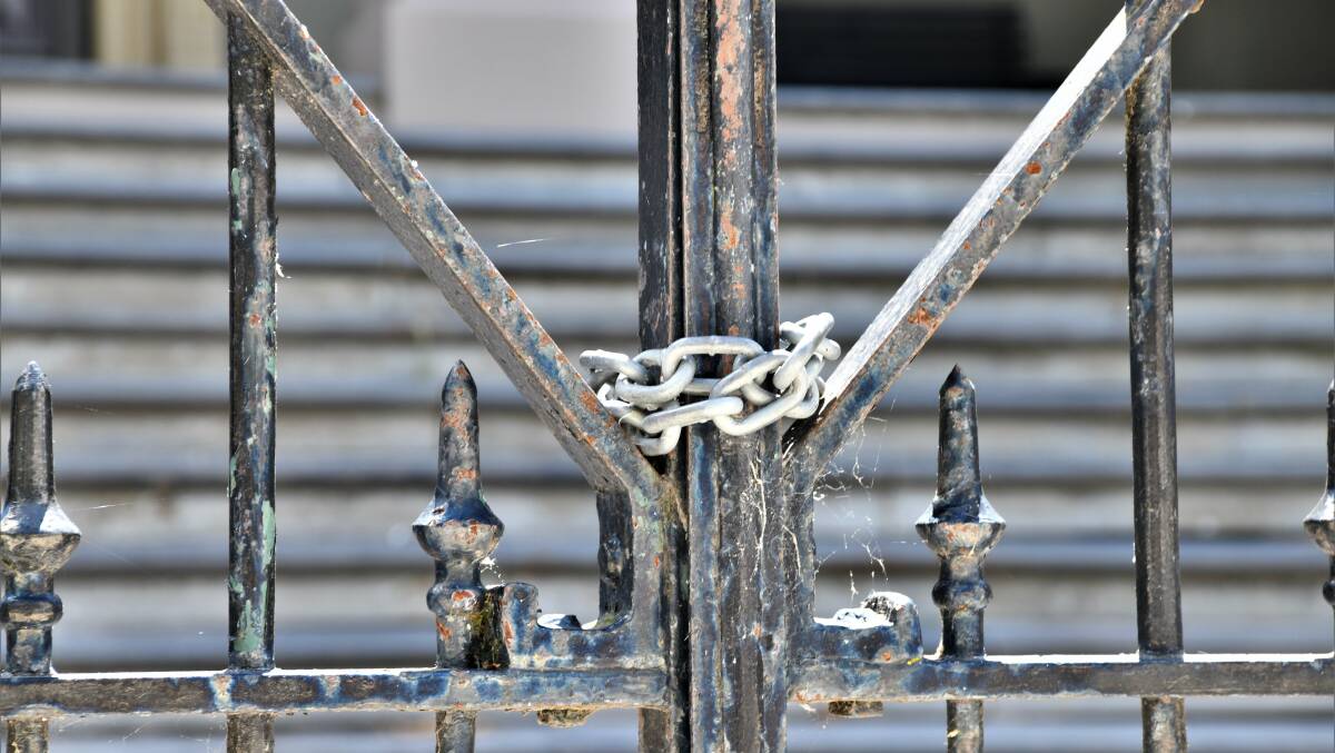 Locked gates at the front of Orange Courthouse. File picture