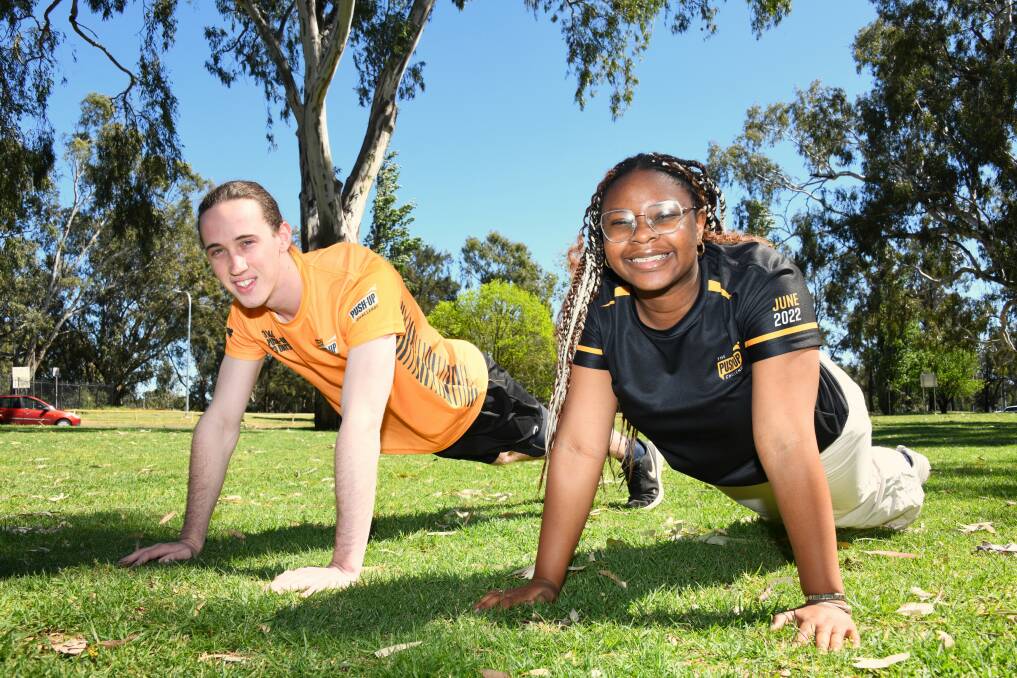 Tom Campbell and Jennifer Ibe are student ambassadors for The Push-Up Challenge, teaming mental health and exercise. Picture by Amy McIntyre