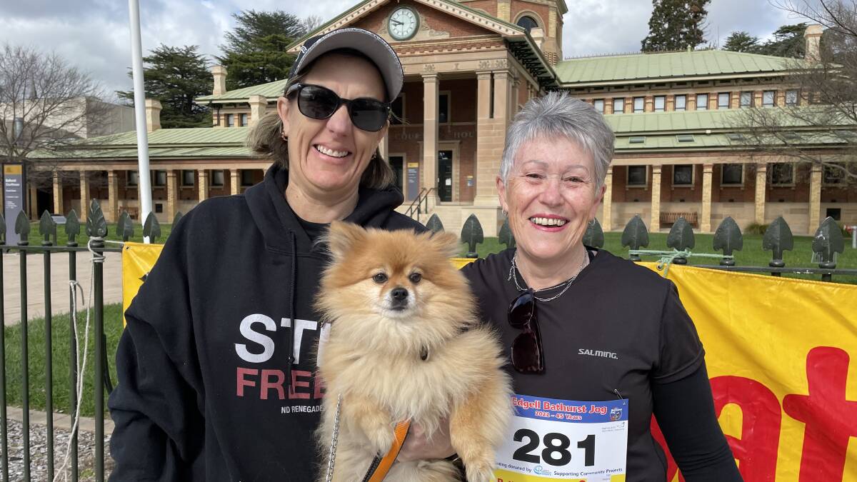 Jackie Cousins and Susan McMahon, with Finn the dog, all of whom were participants in the 2022 Edgell Jog on Sunday.