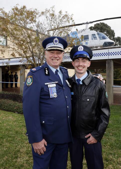  Retiring officer Geoff McKechnie with his son Matthew.