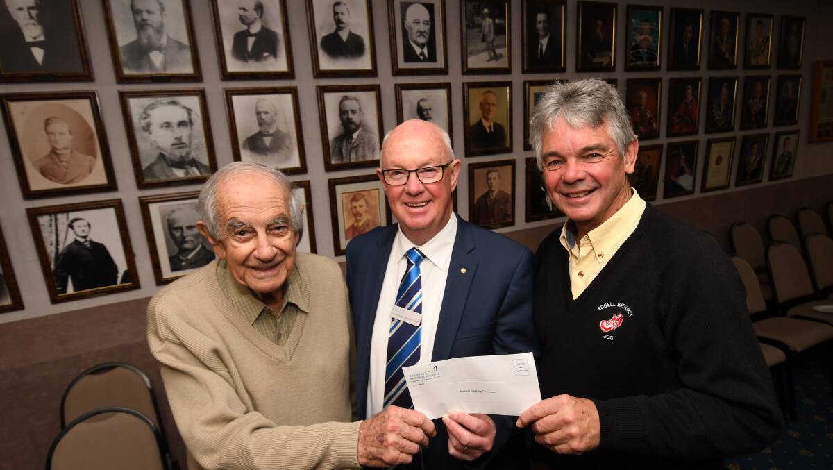 HONOURED: The late Lou Shehade (left) with Bathurst councillor Graeme Hanger and Ray Stapley from the Edgell Jog Committee in 2018.
