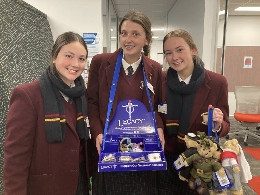 Zoe Cunningham, Gabrielle Kelly and Georgie McPhail volunteered for Legacy on Friday and called into the Western Advocate as part of their rounds in the CBD.