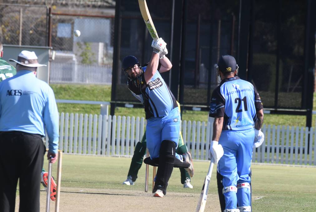 Henry Shoemark hits one over the top. Picture by Jude Keogh