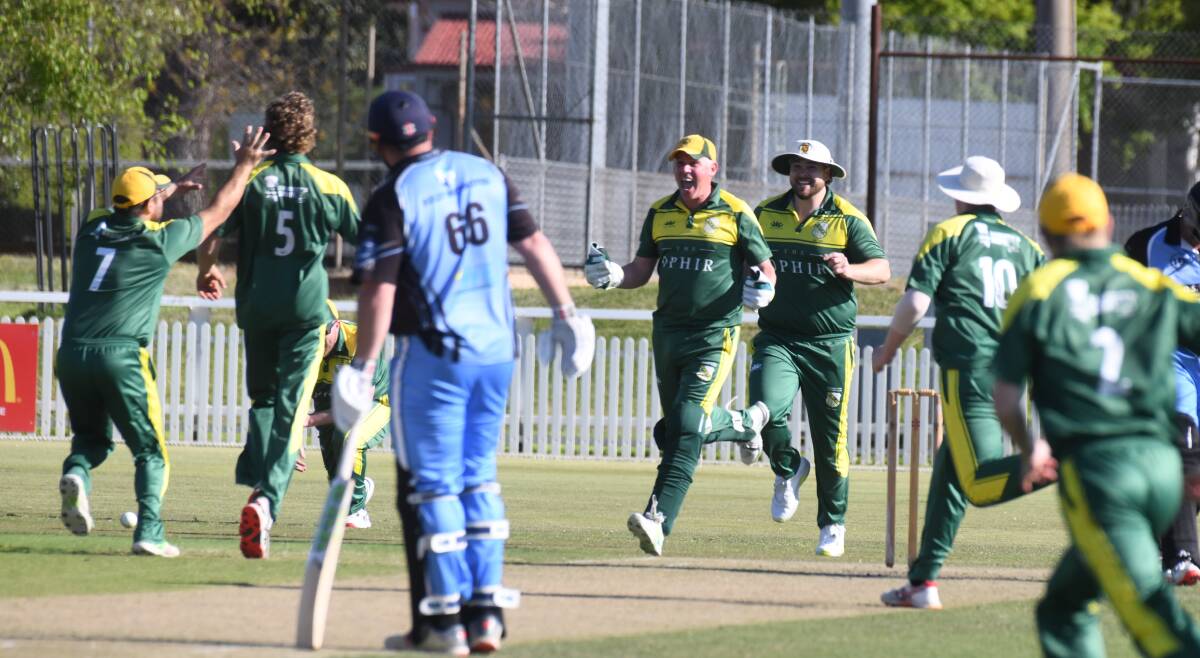 CYMS celebrate Lachlan Wykes' dismissal of Daniel Casey. Picture by Jude Keogh