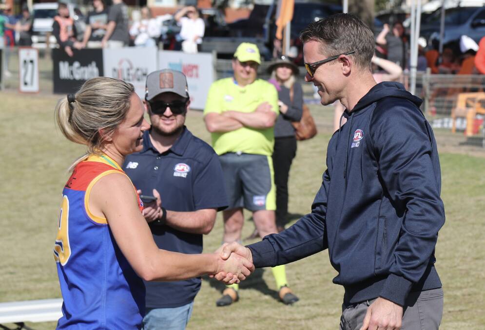Emily Warner accepts her best on ground medal. Picture by Phil Blatch.